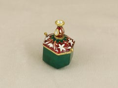 A Mughal emerald scent bottle in 22K gold with hinges for pendant
