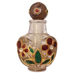 Flacon de parfum moghol en cristal de roche naturel incrusté d'or et de rubis