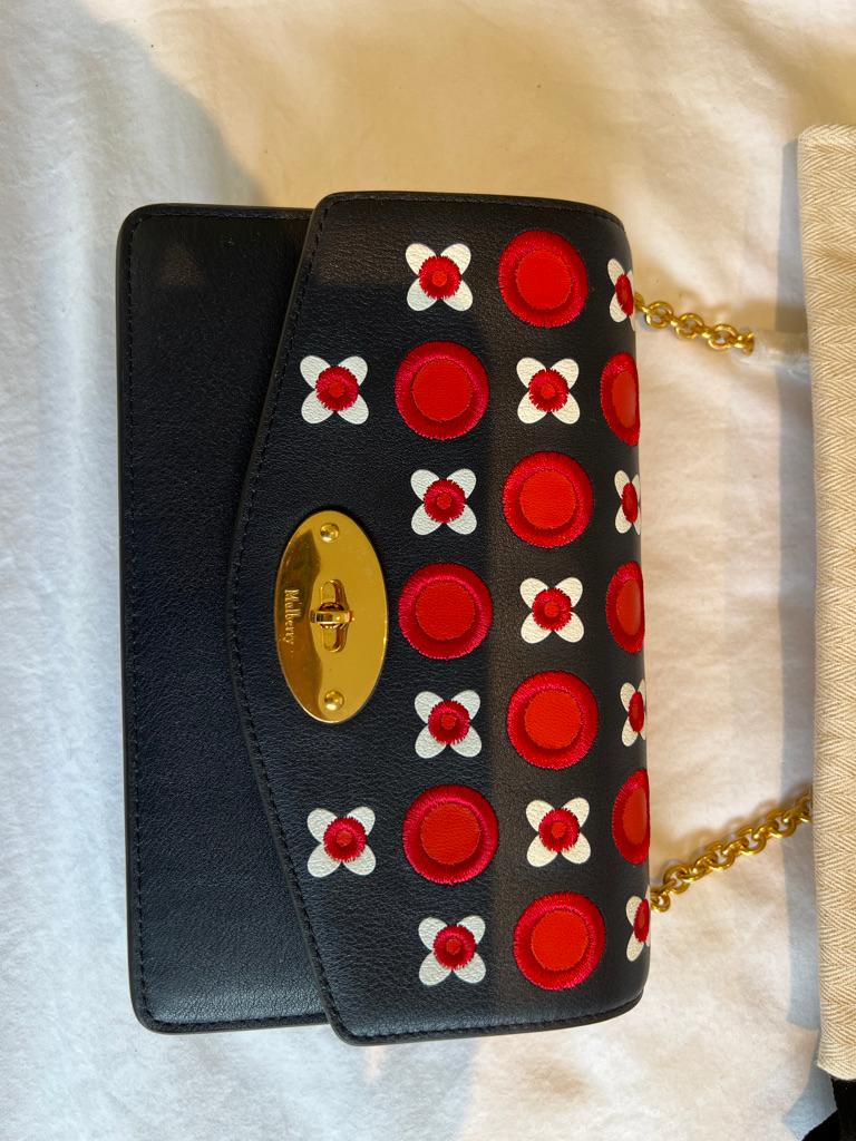 Sought after Mulberry Small Darley handbag in midnight, red and white silky calf geo-floral, 

original packaging, protective wrapping to chain and film to clasp, Mulberry product card, original dustbag, 

condition: excellent, unused, as new.