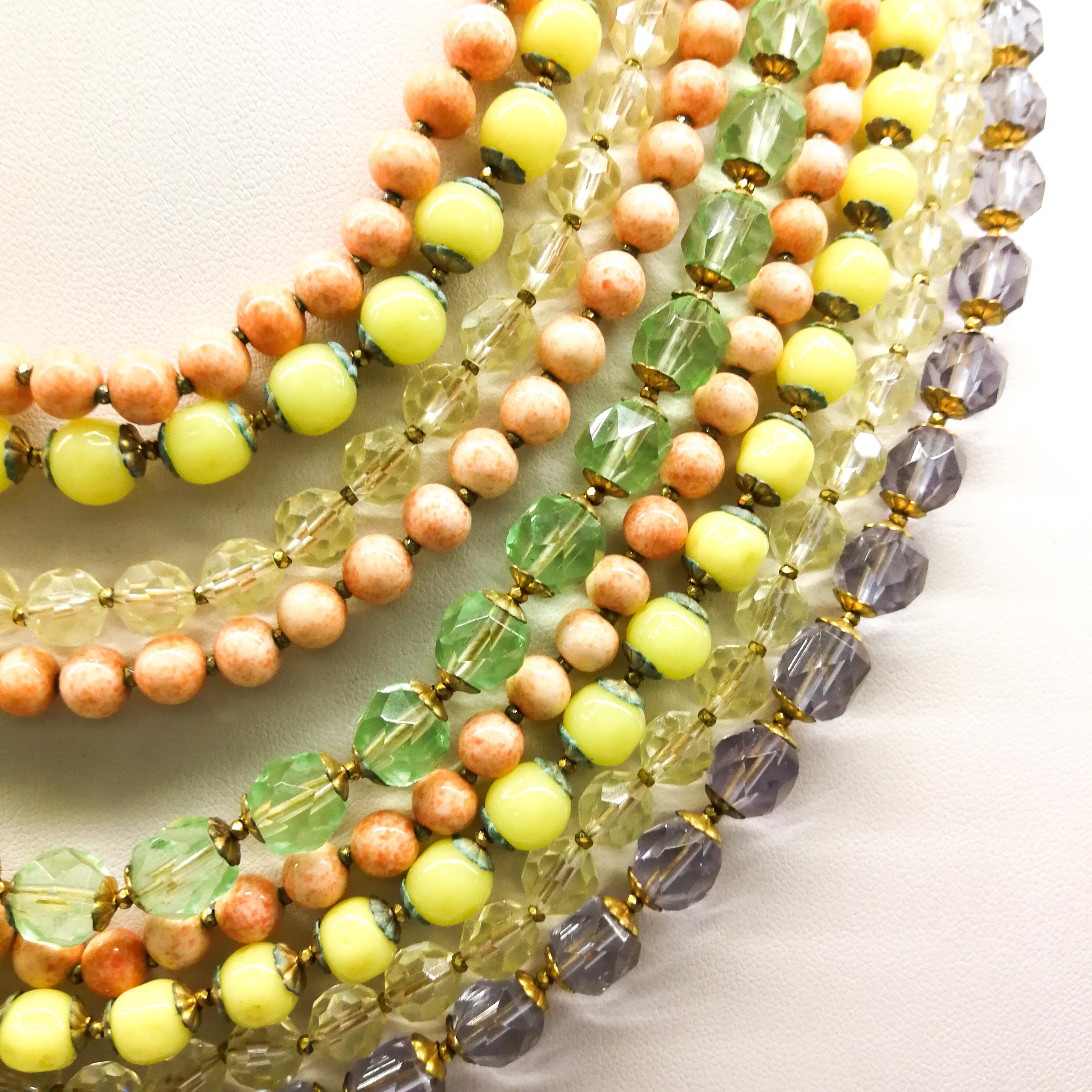 A  multi row, multi coloured glass bead necklace, and earrings, De Mario, 1950s 4