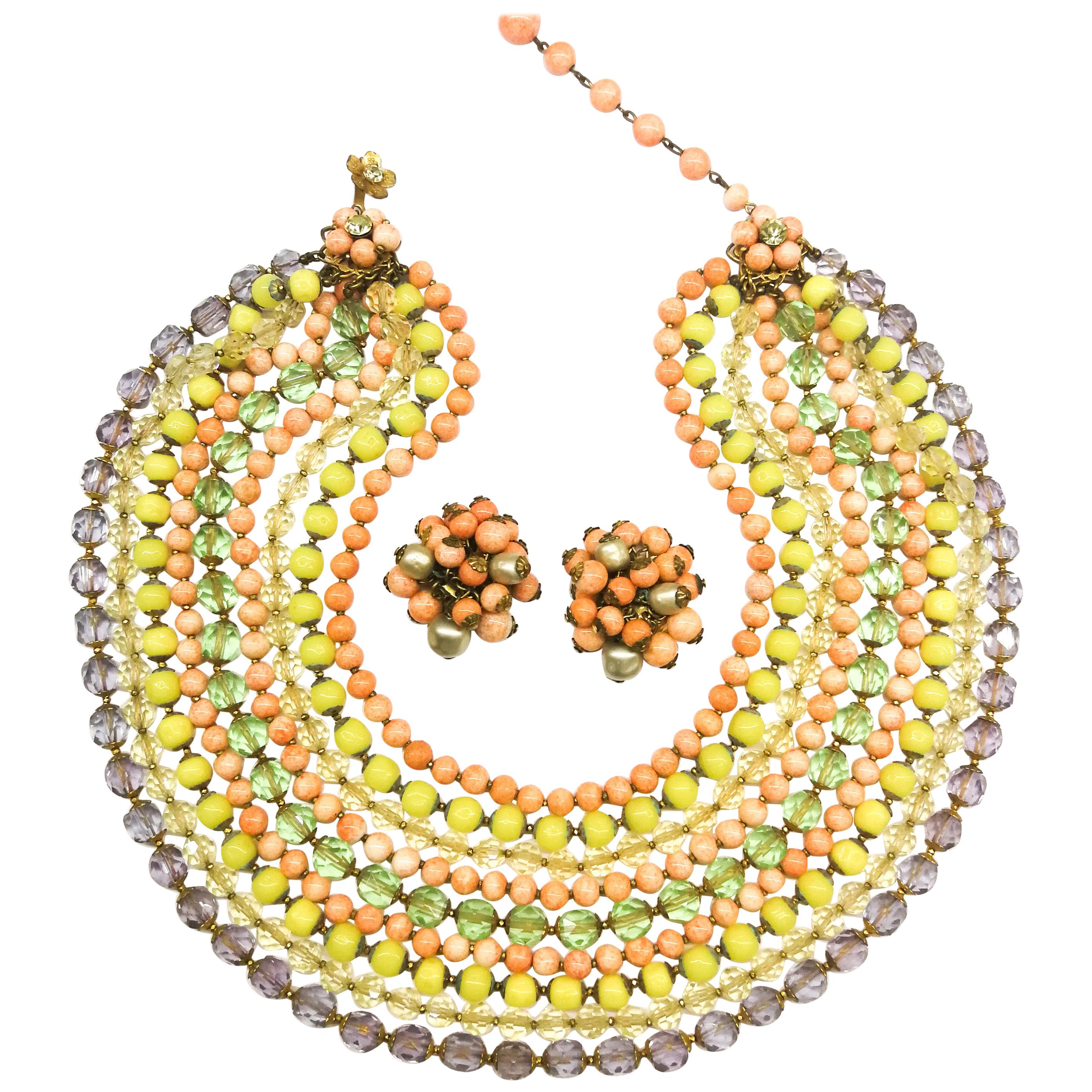 A  multi row, multi coloured glass bead necklace, and earrings, De Mario, 1950s