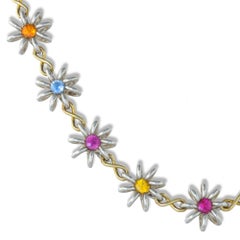 A Multi-sapphire Flower Necklace By Lucie Heskett-brem