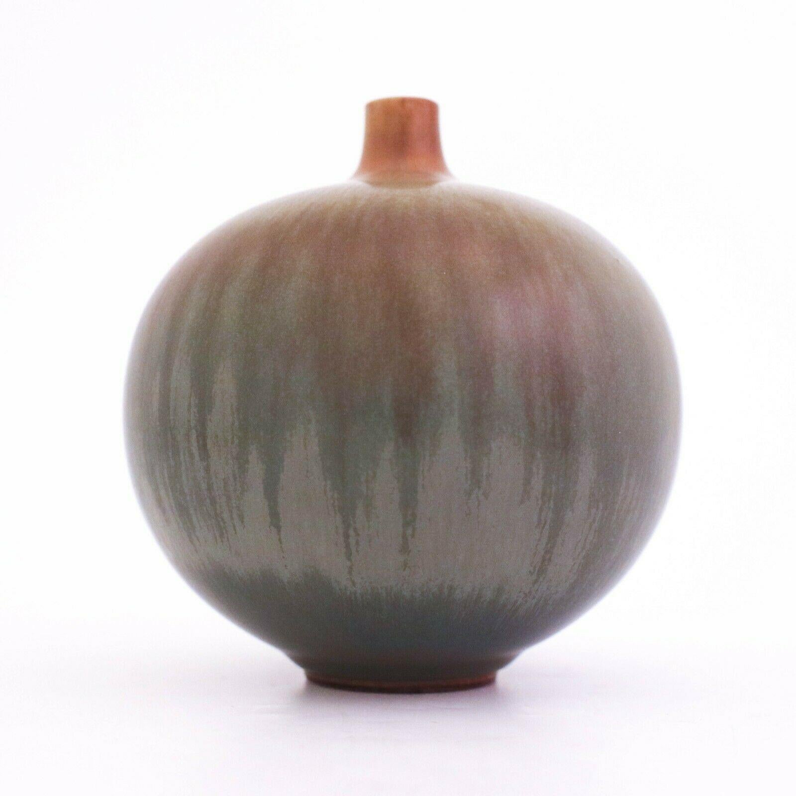 A lovely vase designed by Berndt Friberg at Gustavsberg in Stockholm, the vase is 11.5 cm high with a lovely harfur glase. It's marked as on picture and was made in 1954, it is in excellent condition.