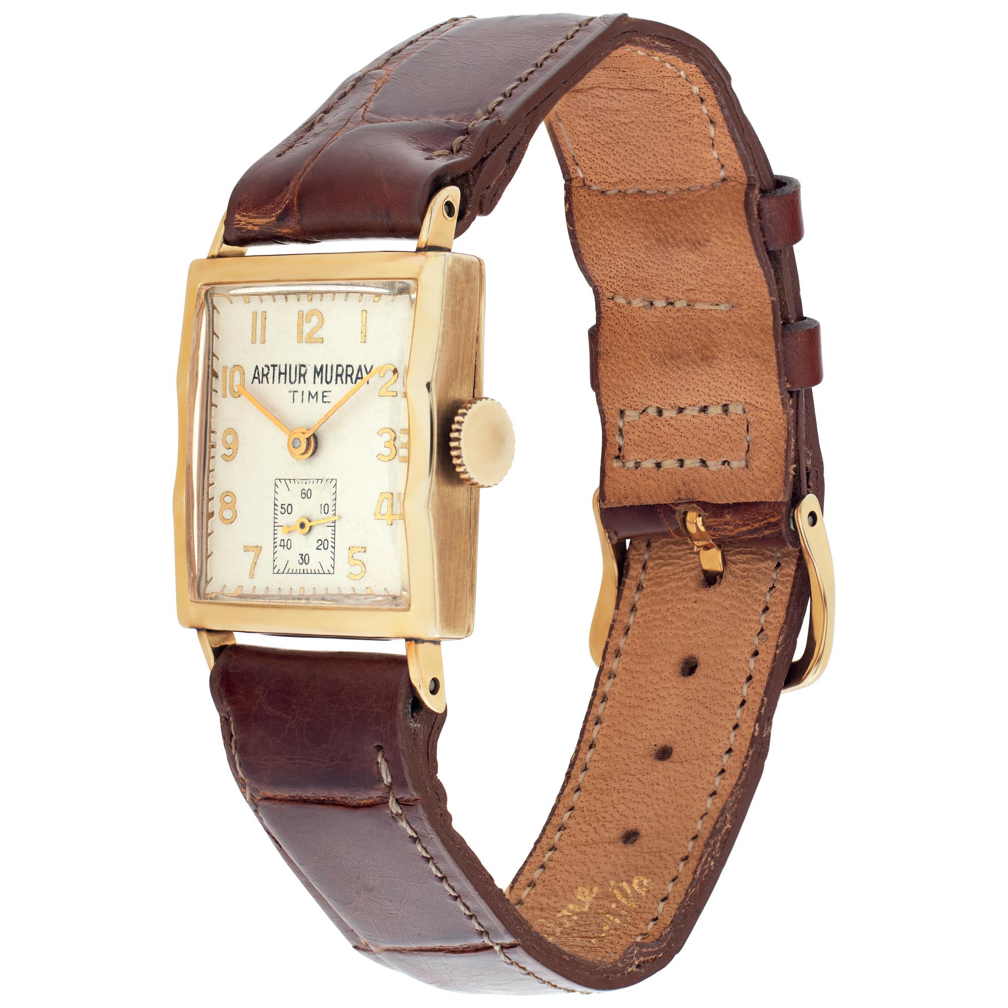 Unisex A. Murray 14k case, 14k bezel, leather leather band with two piece clasp to honor the famous ballroom dancer and buisnessman. Manual wind with Sub-Seconds. Certified pre-owned. Fine Pre-owned A. Murray Watch. Certified preowned Vintage A.