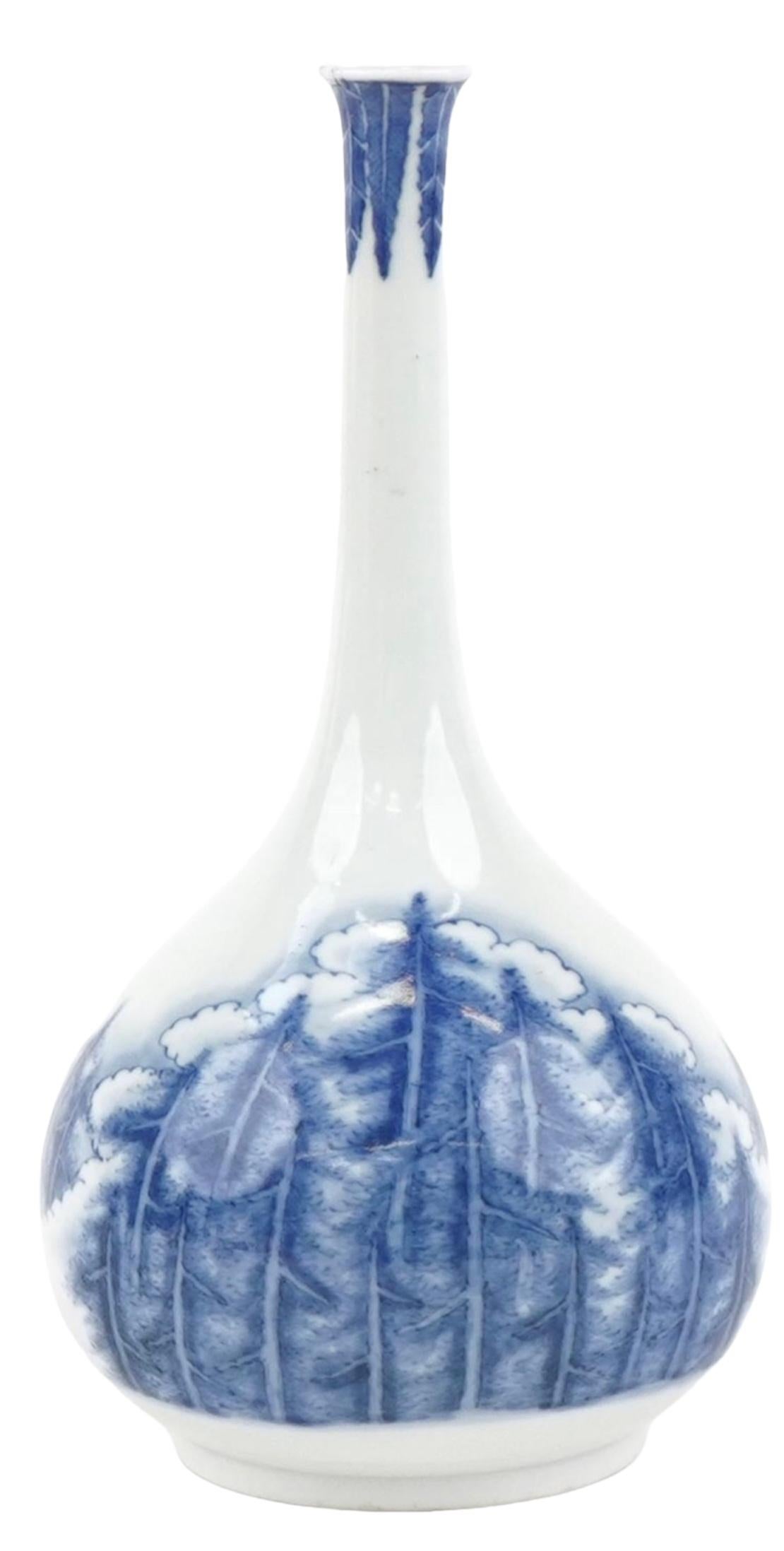 
A Museum Quality Japanese Hirado bottle vase. Signed . Edo period


A Tall-Necked Hirado Vase

Edo - Meiji period (19th century)

Oviform with tall neck, hand painted in underglaze blue hand with a forest scene, Incensed hirado mark to the