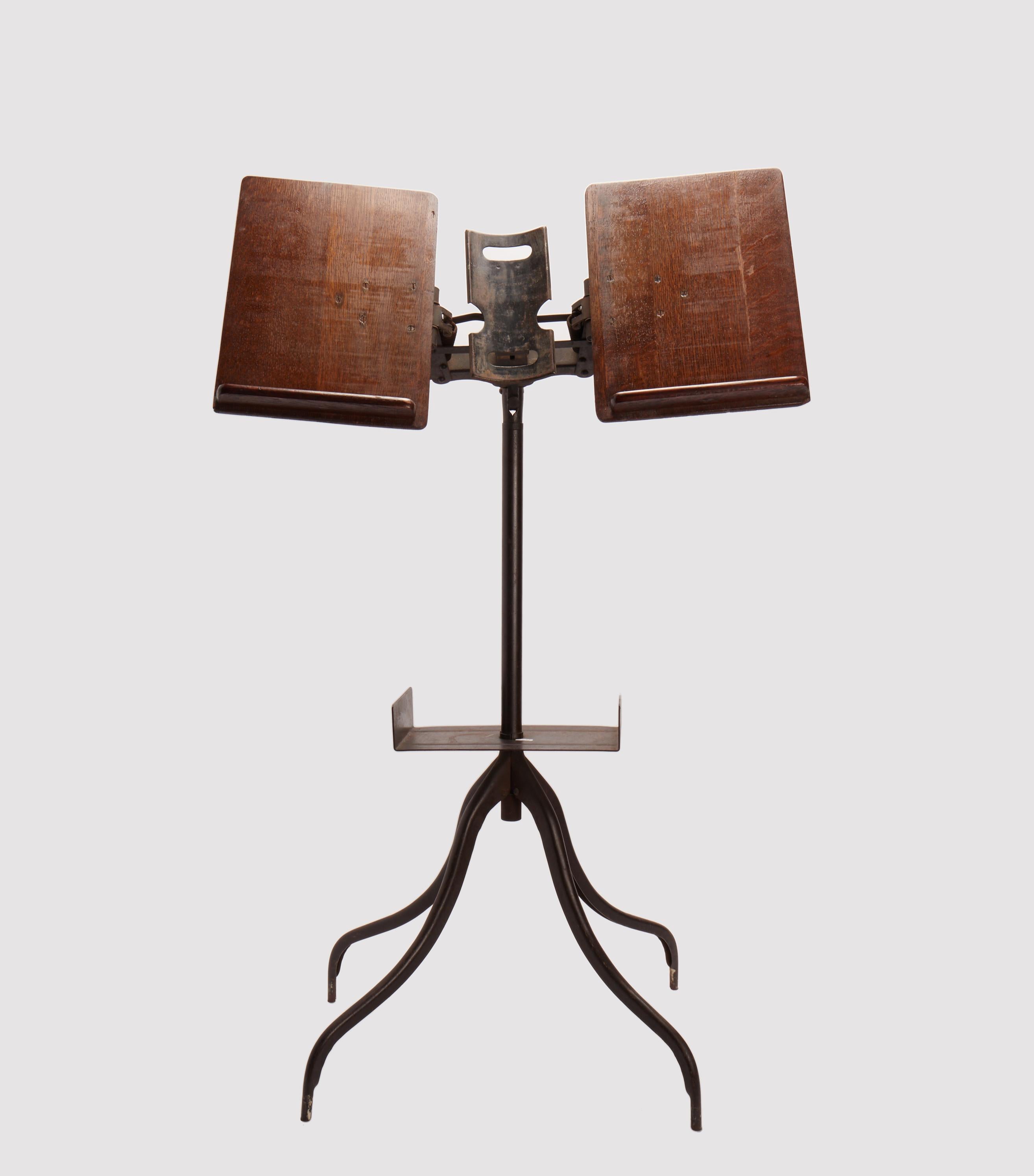 A music score holder, made out of oak wood and iron, with tripod legs. USA beginning 20th century. 