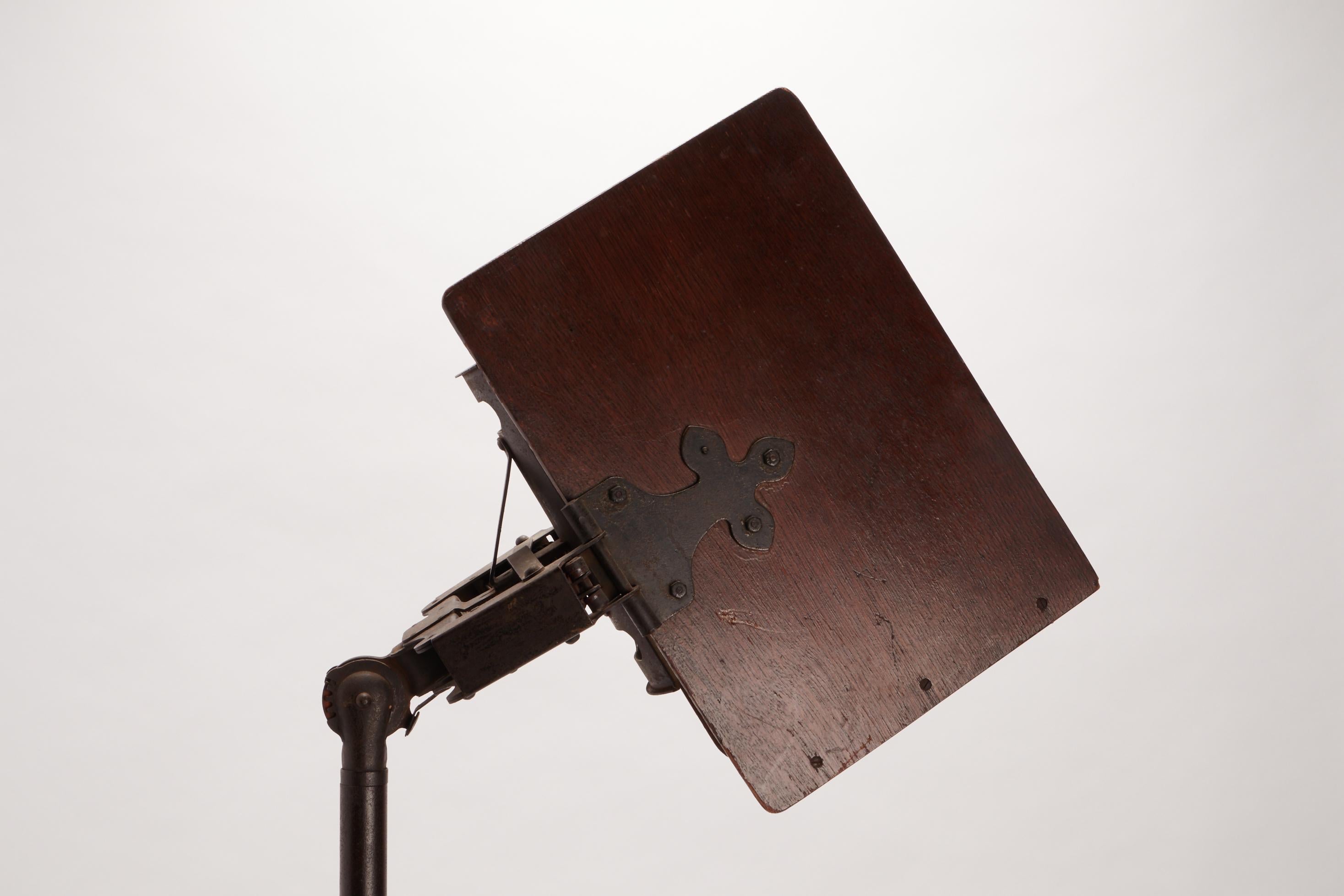 Iron A music score holder made out of oak wood, USA 1912. For Sale