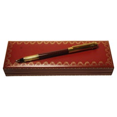 Cartier 18 Karat Gold Nib Burgunderfarbener Lack Trinity Rollerball Schreibstift Trinity
