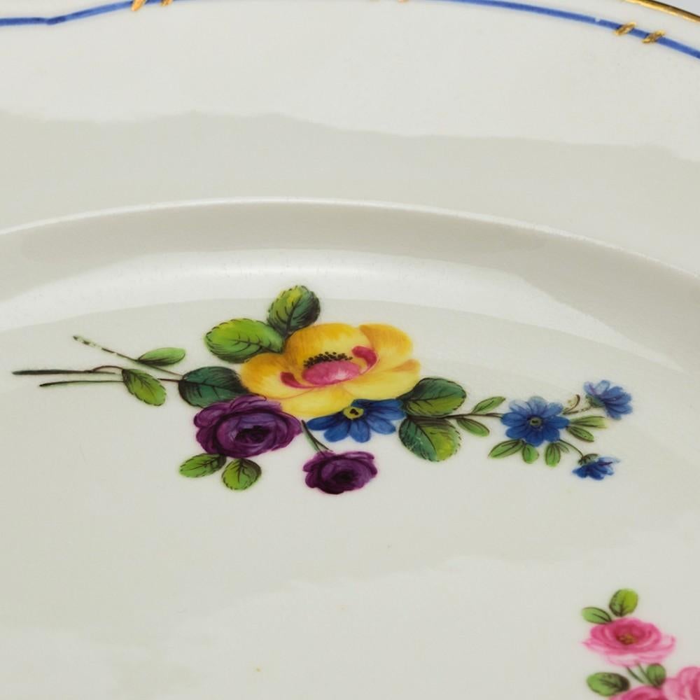 A Nantgarw Porcelain Plate, circa 1820

Additional Information:
Date: 1820
Period: George 111-George 1V
Marks: Impressed on reverse Nantgarw CW
Origin: Nantgarw Wales
Colour: Polychrome 
Pattern: Overglaze scattered flower sprays in the