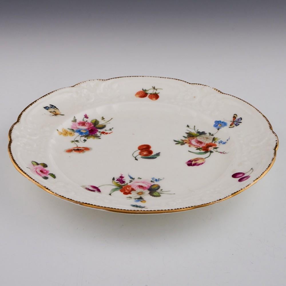A Nantgarw Porcelain Plate with Moulded Lip and Lobed Rim, c1820

Additional information:
Date : 1813-1822
Period : George III - George IV
Marks :Impressed Nantgarw CW mark
Origin : Nantgarw, South Wales
Colour :Polychrome with gilt highlight to