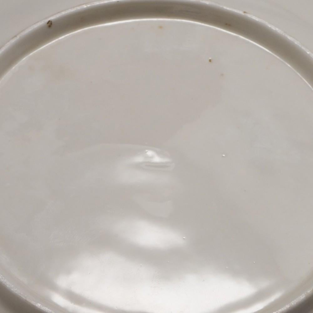 English A Nantgarw Porcelain Plate with Moulded Lip and Lobed Rim, c1820