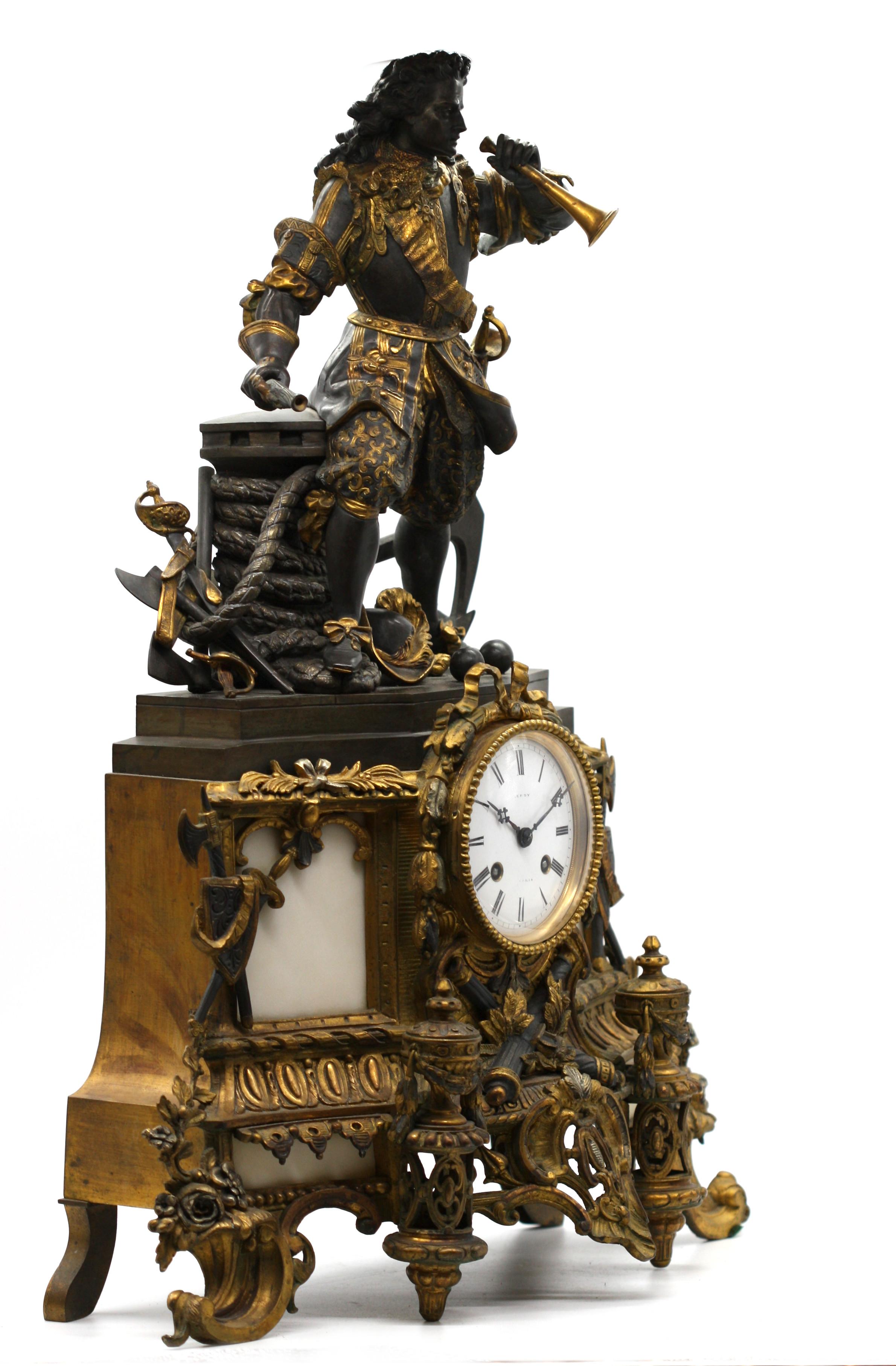 A Napoleon III Gilt and patinated bronze figural mantel clock,
Late 19th Century: The Buccaneer.
The dial signed 'Leroy/Paris' Height 22.5 in. (57.15 cm.).

 