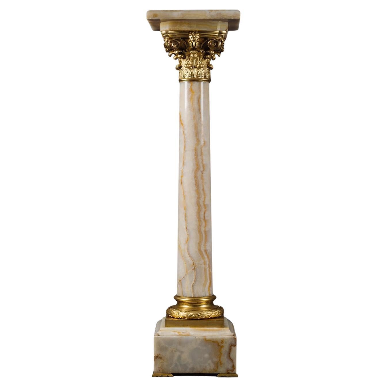 Un pedestal de ónice argelino y bronce dorado Napoleón III en venta