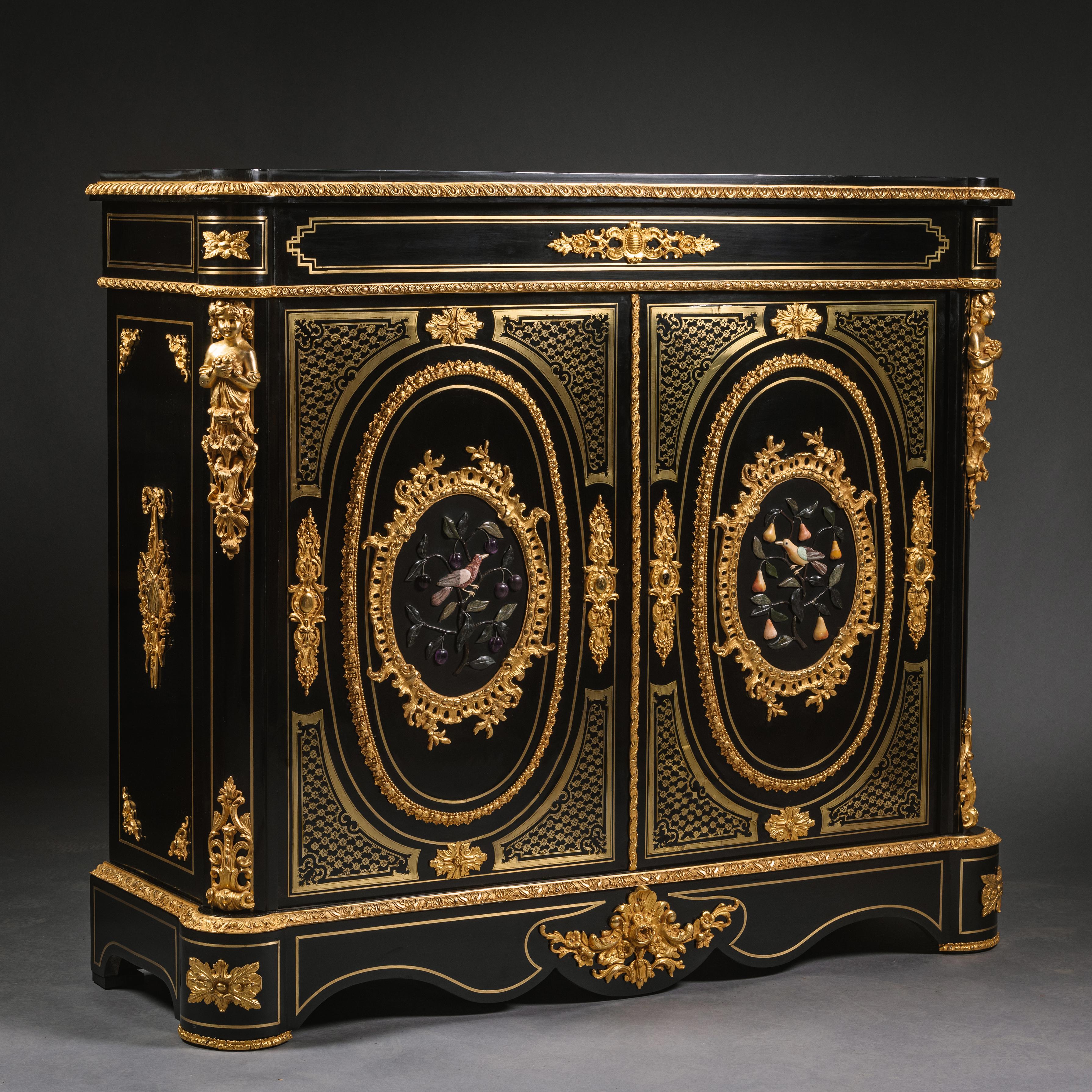 A Napoleon III Gilt-Bronze and Hardstone Inset Ebonised Pier cabinet. 

The bronze mounts stamped to the reverse 'PA'. 

This impressive side cabinet has fine gilt-bronze mounts set against an ebonised case, further enriched with hardstone