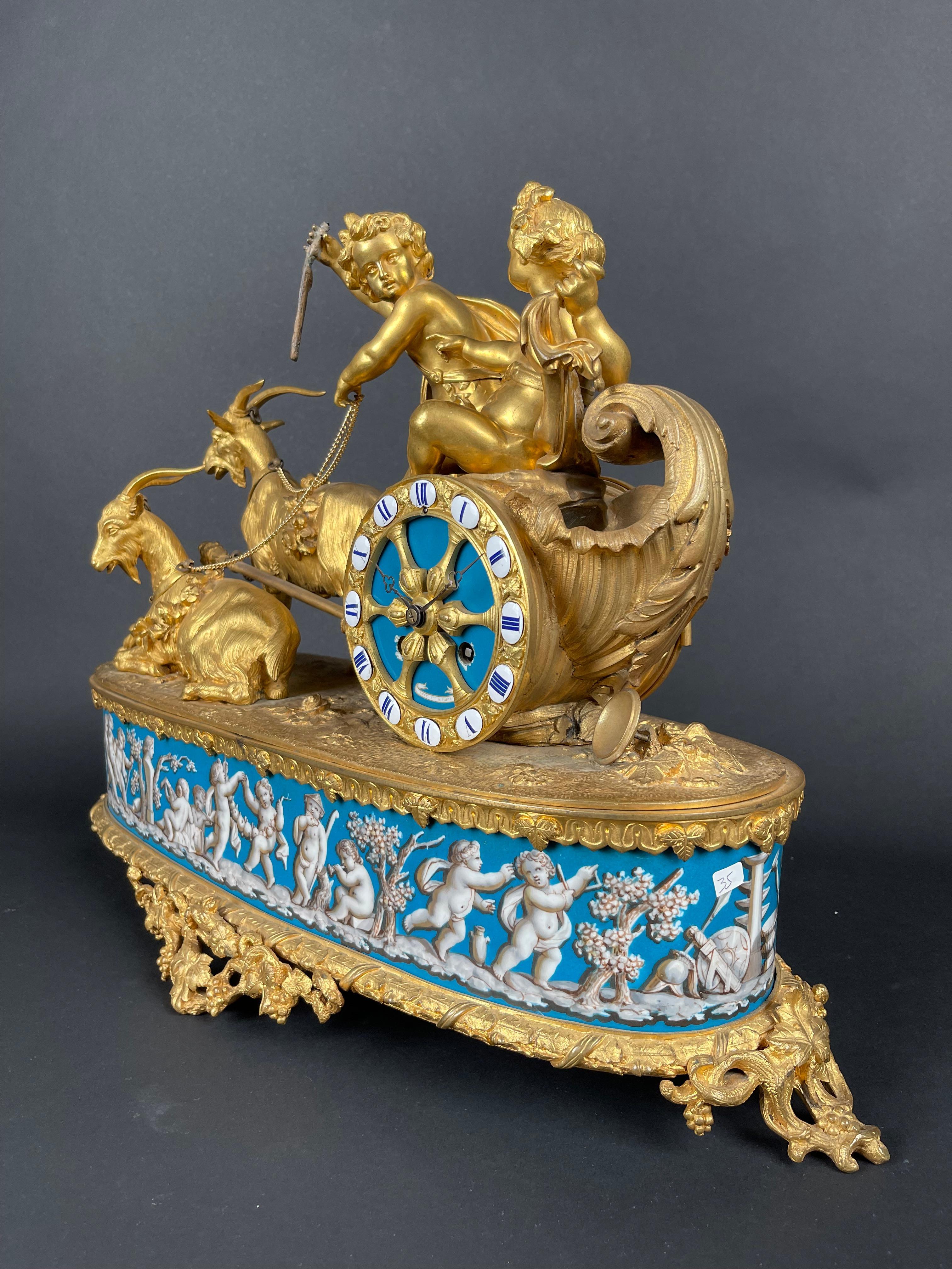 A Napoleon III gilt-bronze and porcelain clock By Levy Freres, France, 19th C. For Sale 2
