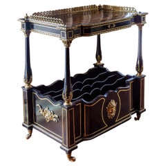 A Napoleon III gilt bronze-mounted ebony and brass inlaid rectangular etagere