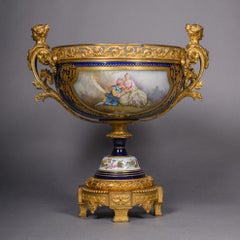 A Napoléon III Gilt-Bronze Mounted Sèvres Style Garniture Set
