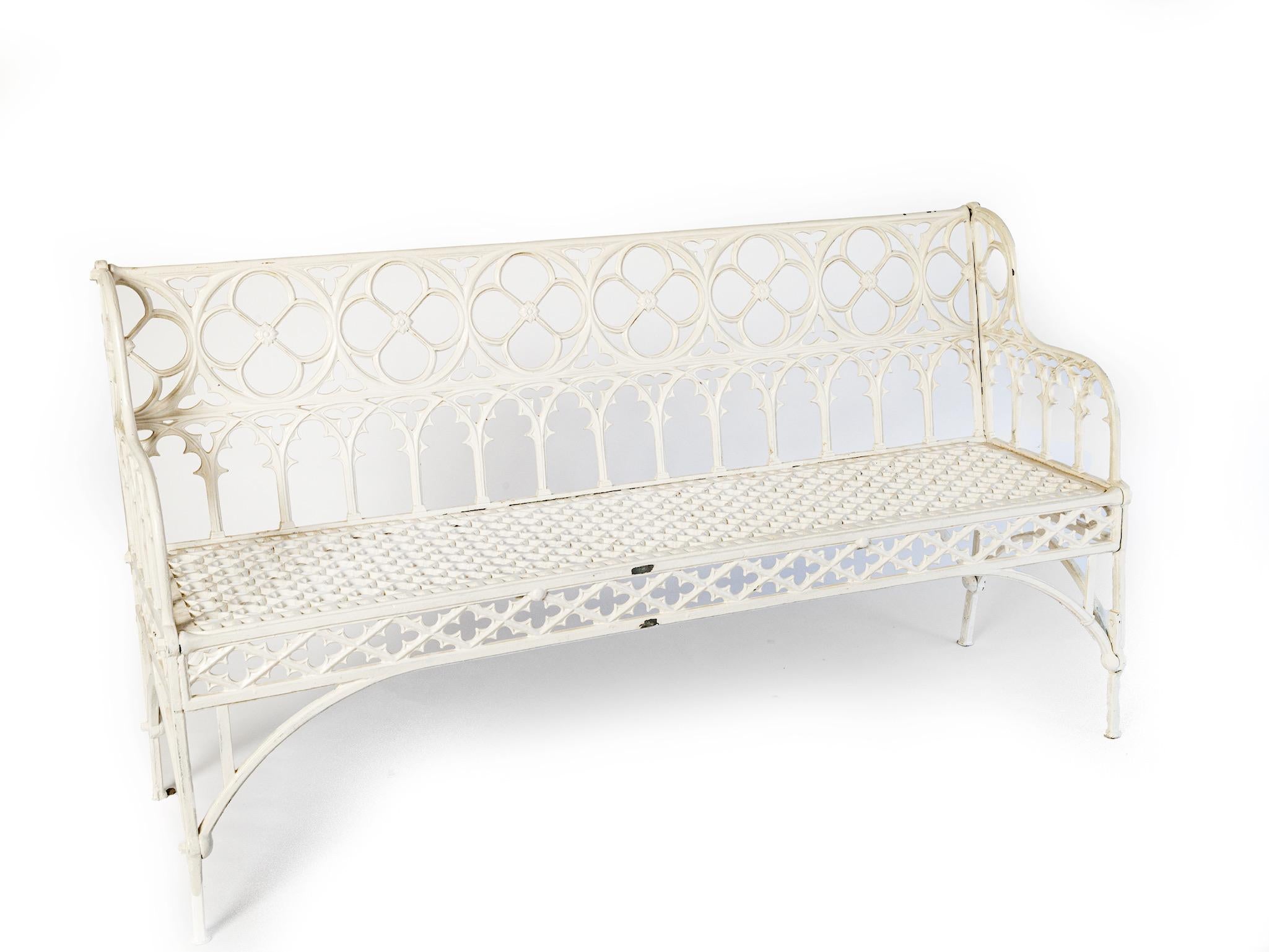 A Napoleon III gothic cast iron garden bench by Foundry Val D’Osne. The model of this bench was created and manufactured by Jean Jaques Ducel around 1850 and later on was taken over by Val D’Osne after 1879. This bench has been repainted by the