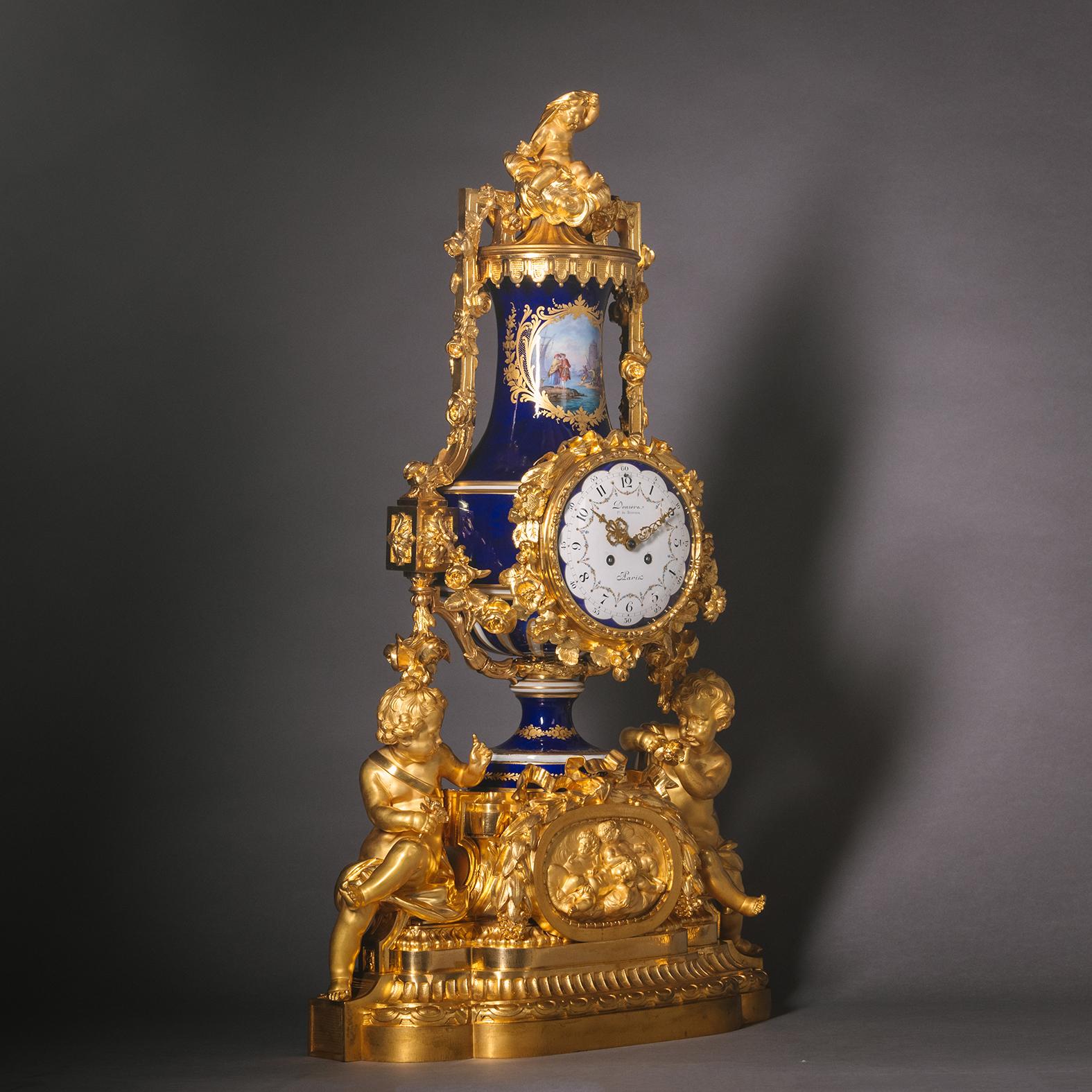 A Napoleon III Period Sèvres Style Porcelain Three-Piece Clock Garniture In Good Condition For Sale In Brighton, West Sussex
