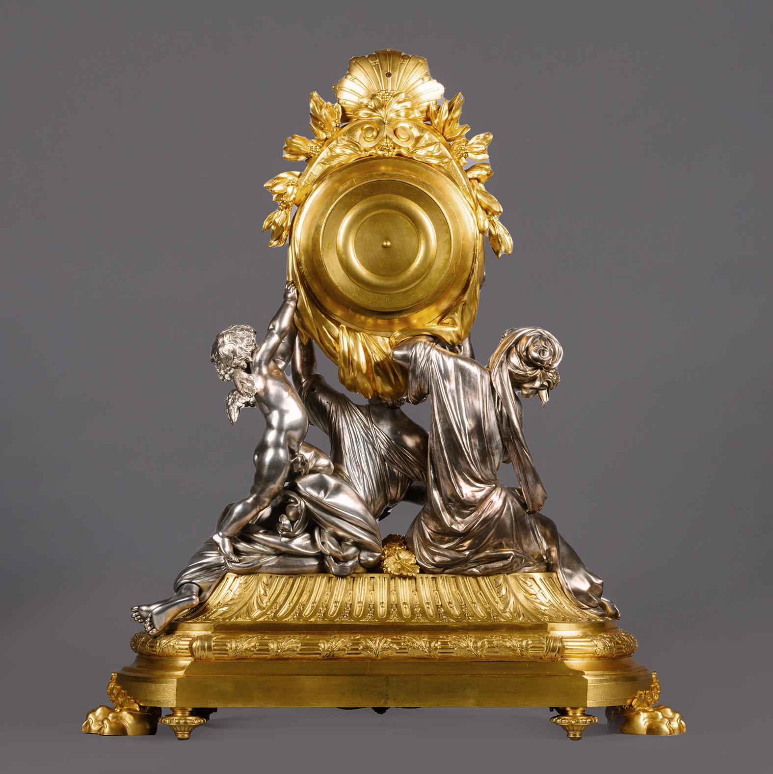French A Napoléon III Silvered-Bronze Clock Garniture by Charpentier, Paris For Sale
