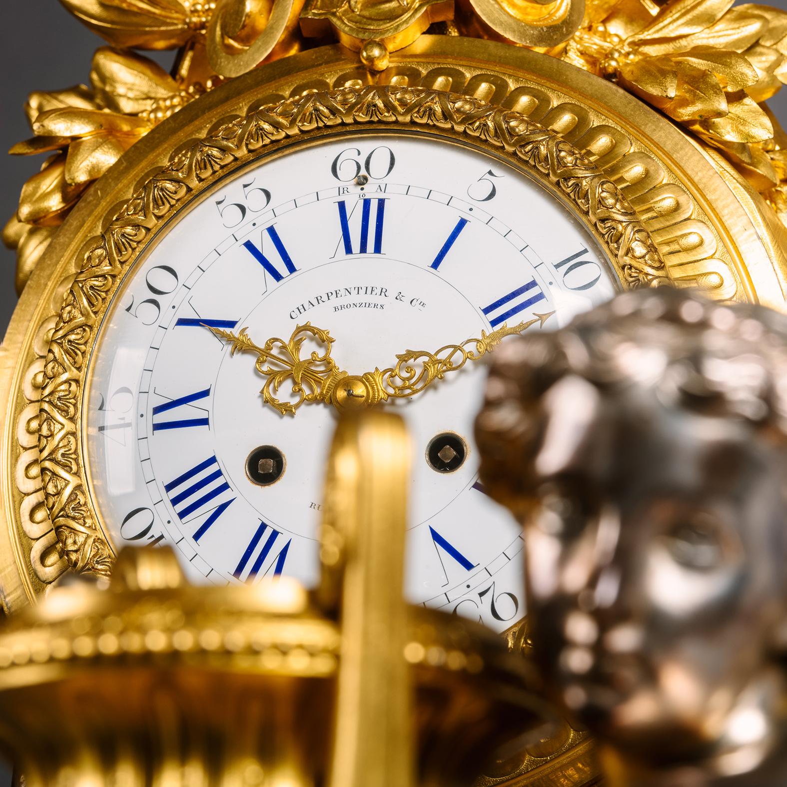 A Napoléon III Silvered-Bronze Clock Garniture by Charpentier, Paris For Sale 1