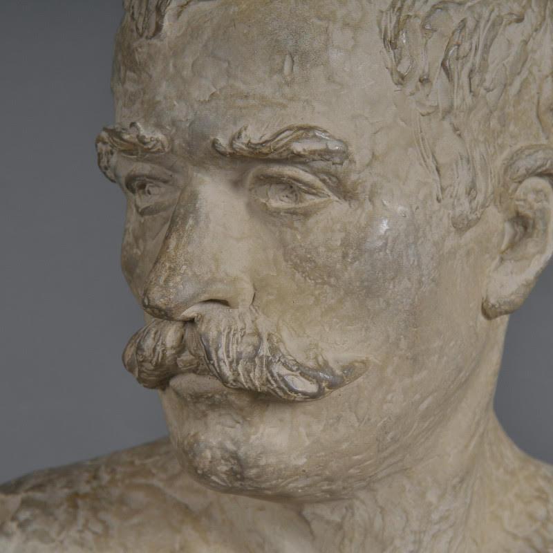 A Napoleon III style terracotta bust of a man, 20th century.

Terracotta sculpture of a moustachioed man in the Napoleon III style, 20th century.
H: 38cm, W: 29cm, D: 17cm