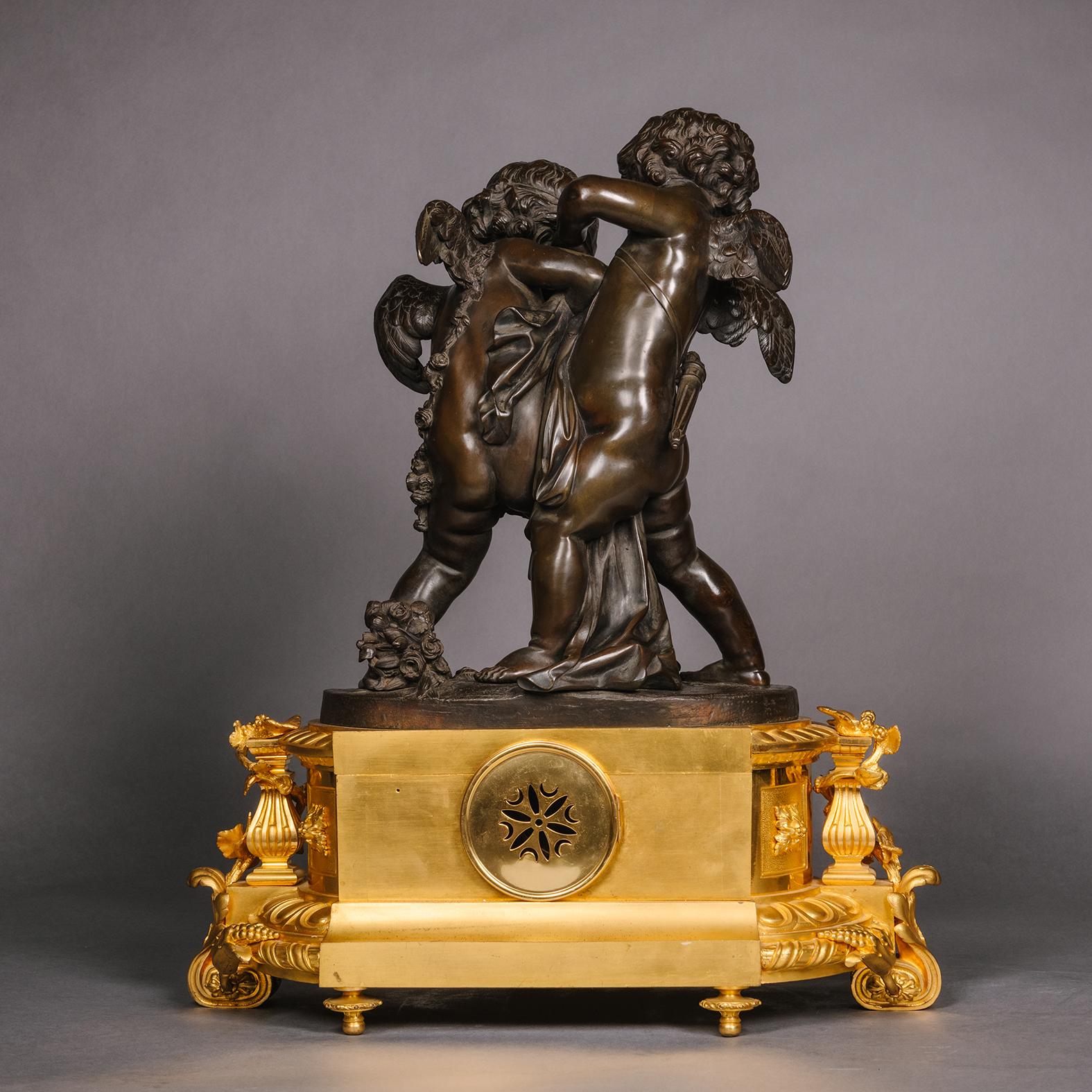 Gilt A Napoleon III Three Piece Figural Clock Garniture For Sale