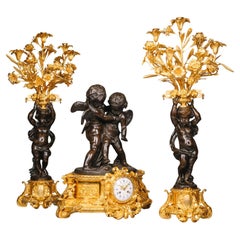Garniture de pendule figurative à trois pièces Napoléon III