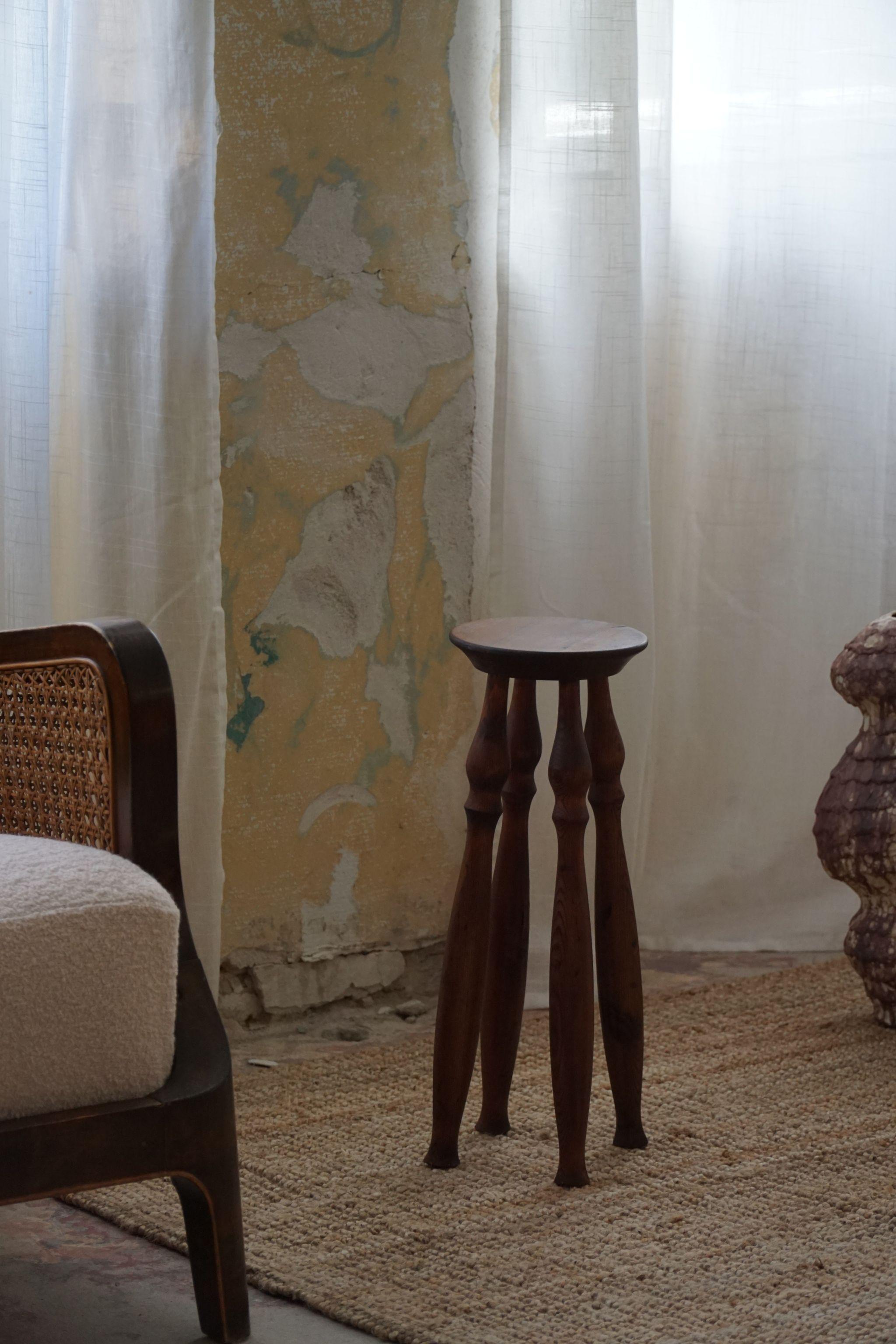 A Danish modern pedestall in solid pine, made in the 1950s. The warm, natural hues of solid pine and unadorned simplicity make it a versatile and timeless addition to any space. 