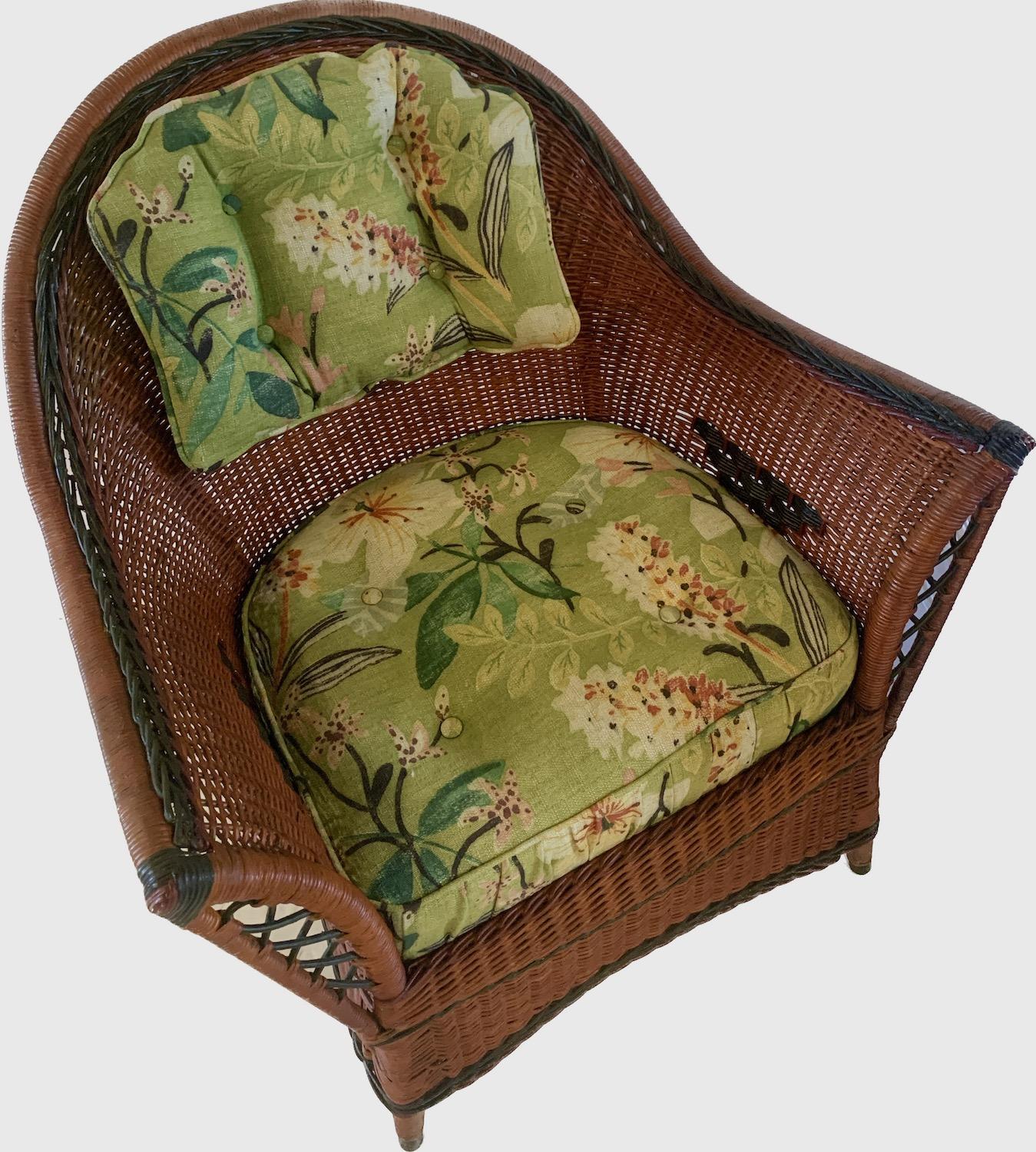 This is a particularly good looking natural finished wicker arm chair having paint decorated trim and design.This was made by the Heywood Wakefield Company in Gardner Massachusetts in the late teens or early 1920s. it is  a good size and very