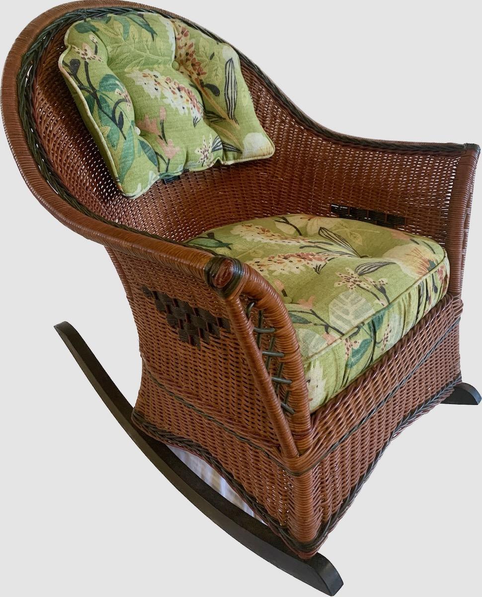 This is a particularly good looking natural finished wicker rocker having paint decorated trim and design.This was made by the Heywood Wakefield Company in Gardner Massachusetts in the late teens or early 1920s. it is  a good size and very