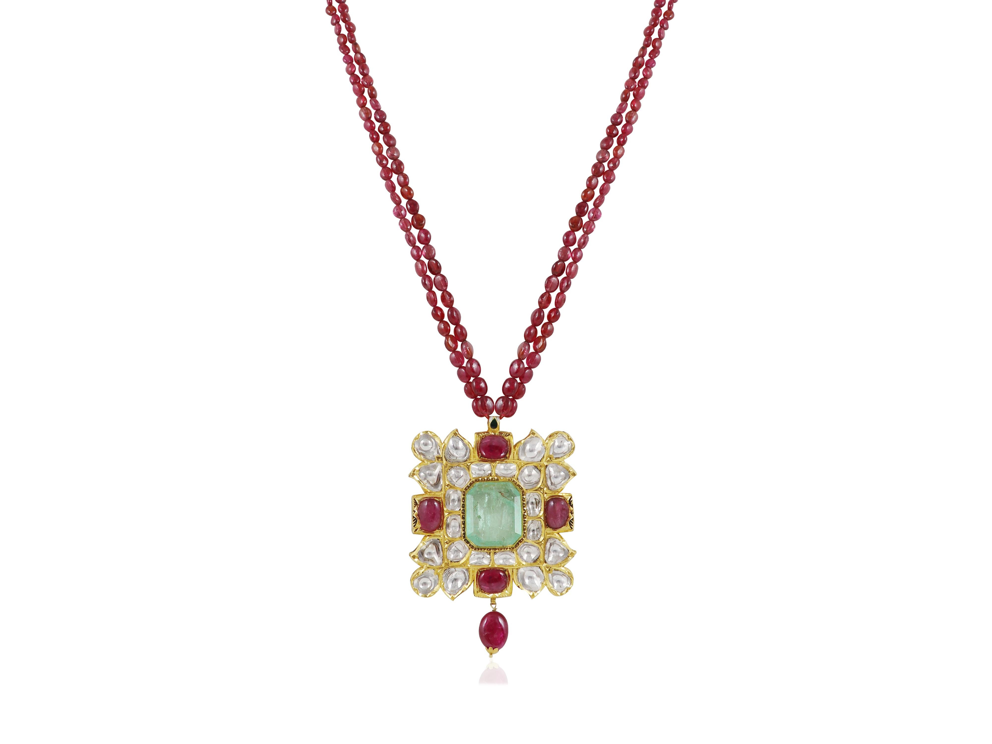 Emerald Cut A natural Colombian emerald, Spinels and Diamond polki Gold pendant from India For Sale