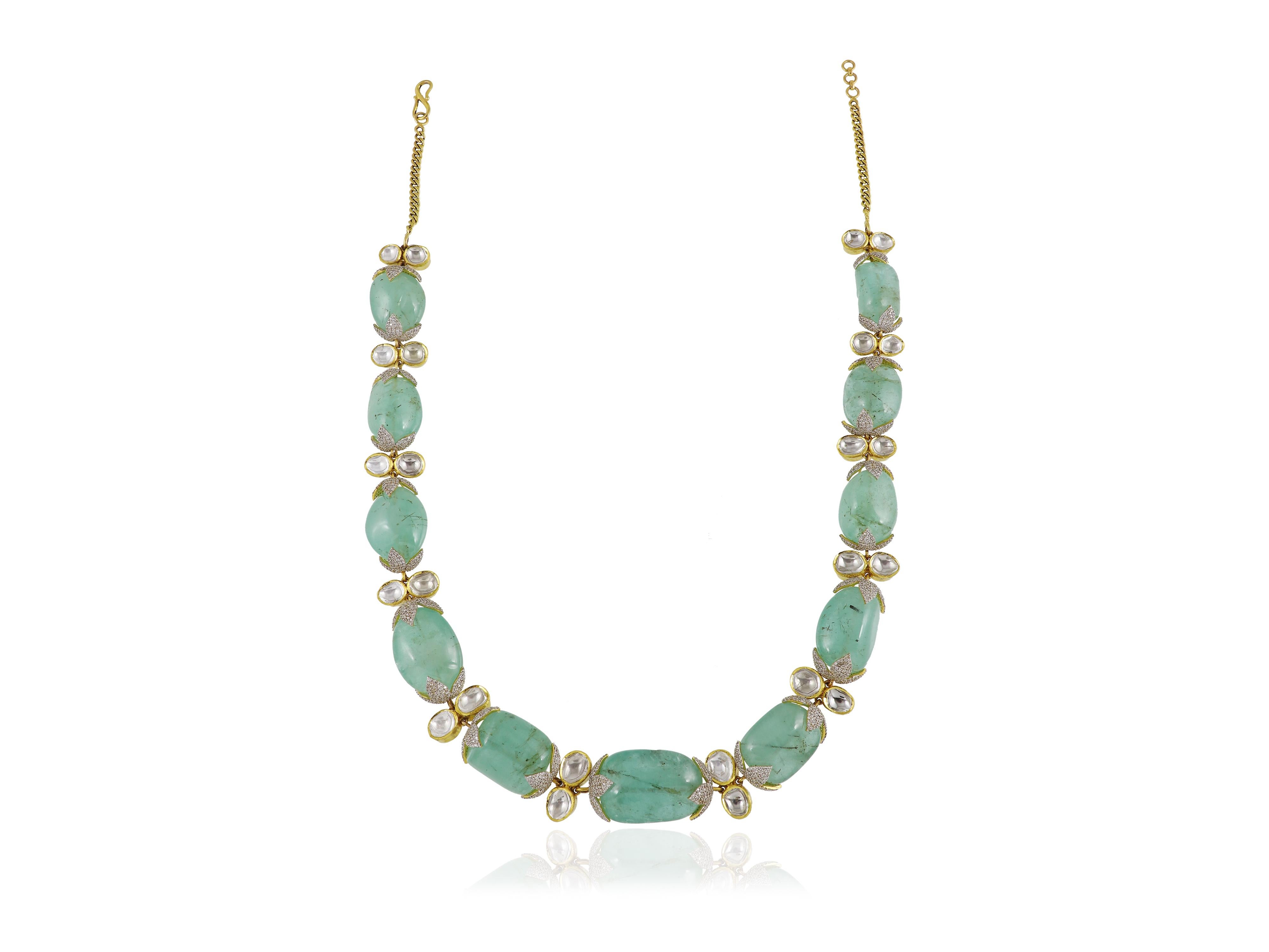 Tumbled A natural emerald necklace set in 18K yellow gold along with natural diamonds For Sale