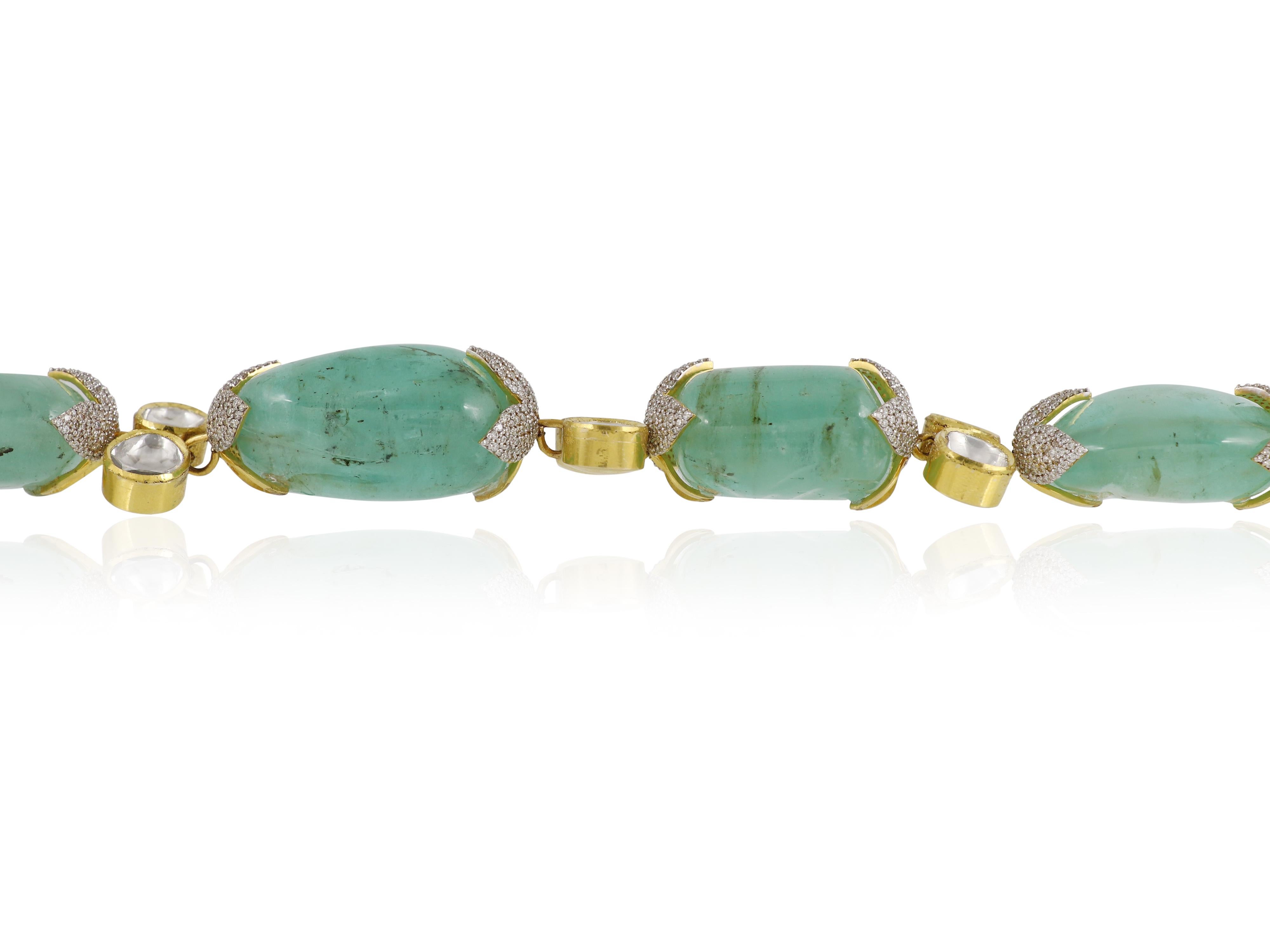 A natural emerald necklace set in 18K yellow gold along with natural diamonds For Sale 1