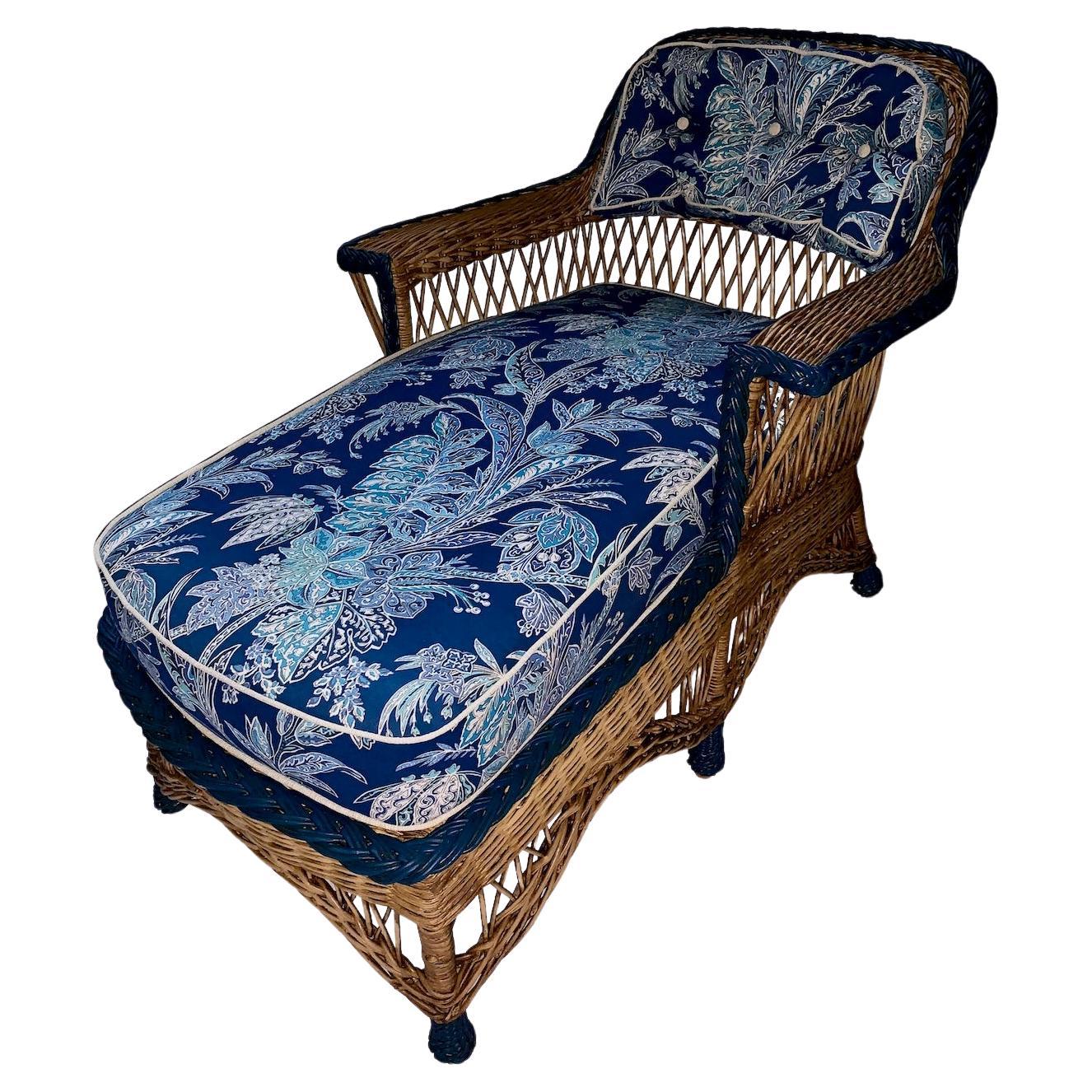 A Wicker Bar Harbor Style Chaise Lounge, Natural Finish with Navy Blue Trim For Sale