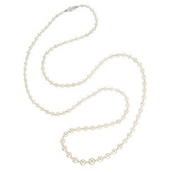 A natural pearl and diamond necklace