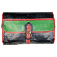 A navy and green leather clutch bag by Yves Saint Laurent Circa 1975