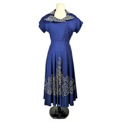 A Navy French Day Dress with white piping appliqué Circa 1945-1950