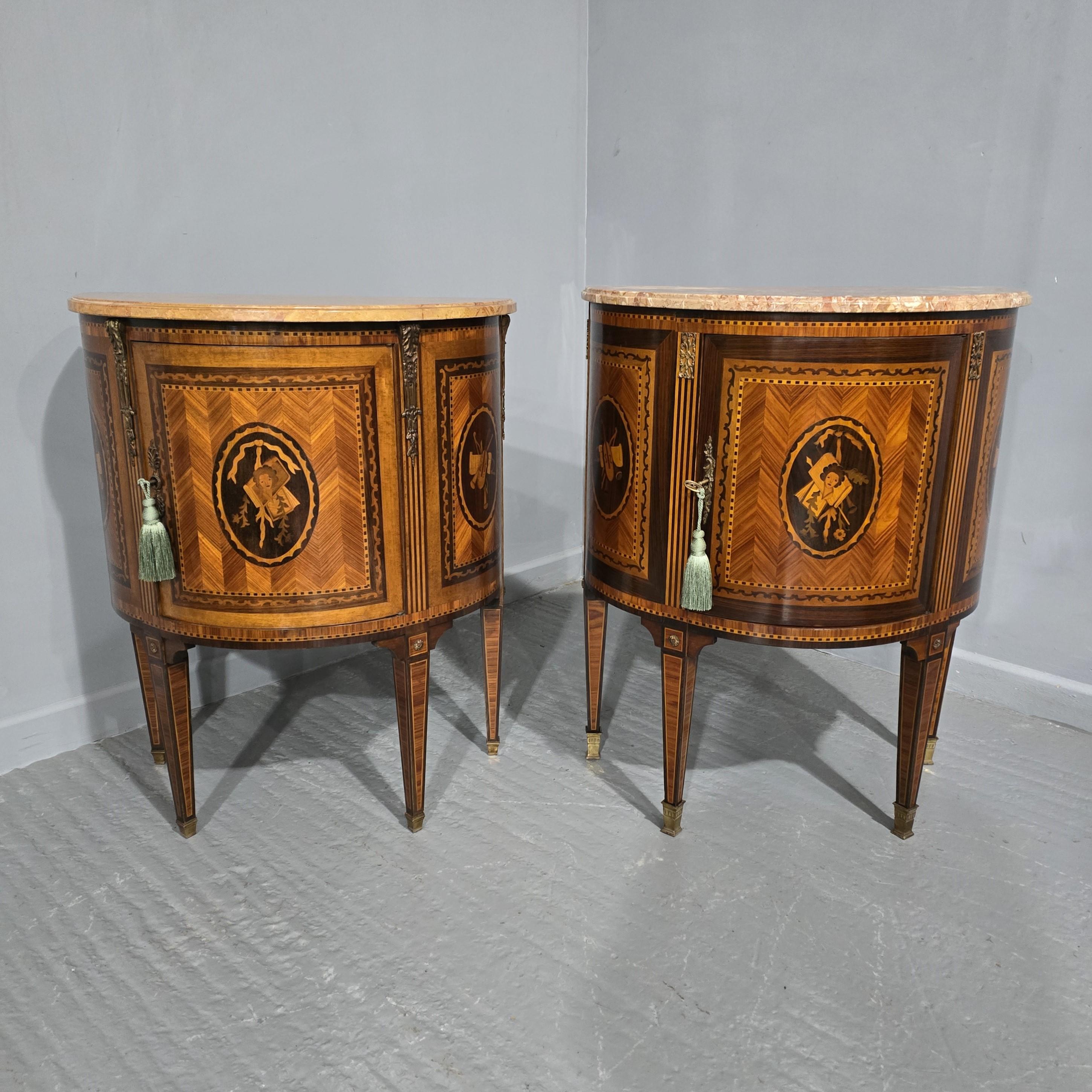 A very nice near pair of French demi loon single door cabinets, standing on brass feet, and with marble tops, excellent colour and condition.
Would sell seperately.

35.5