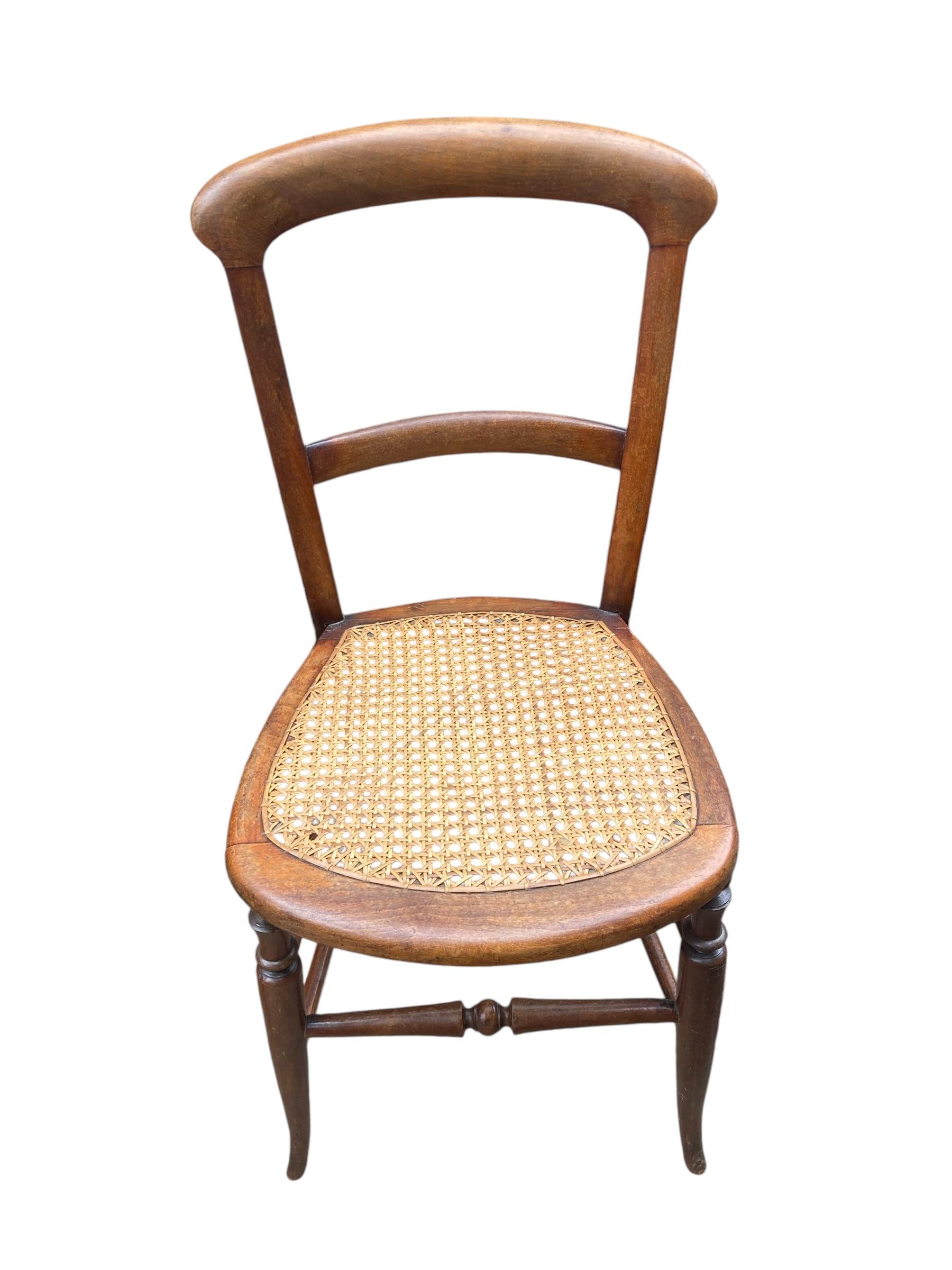 A near pair of Beech framed Victorian side chairs with original Bergere seating 5