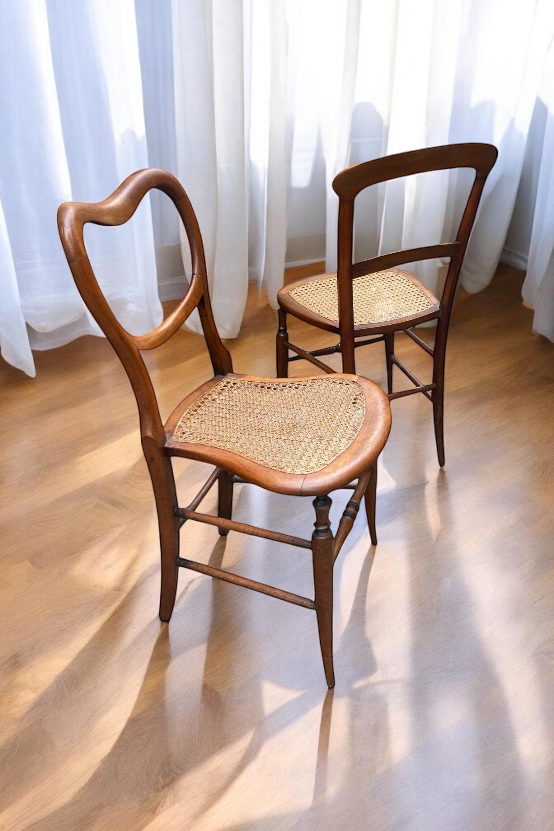 British A near pair of Beech framed Victorian side chairs with original Bergere seating