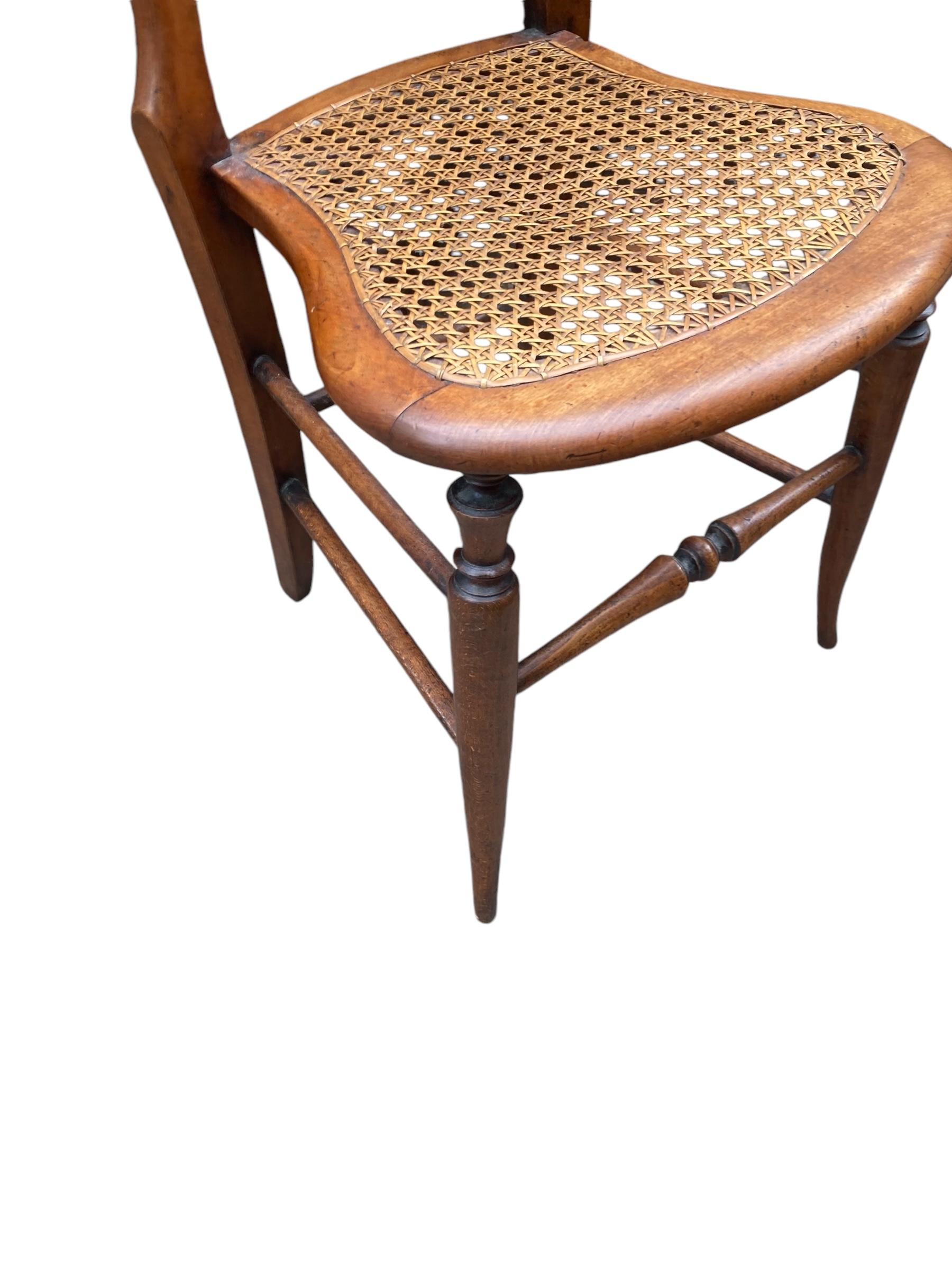 A near pair of Beech framed Victorian side chairs with original Bergere seating 1
