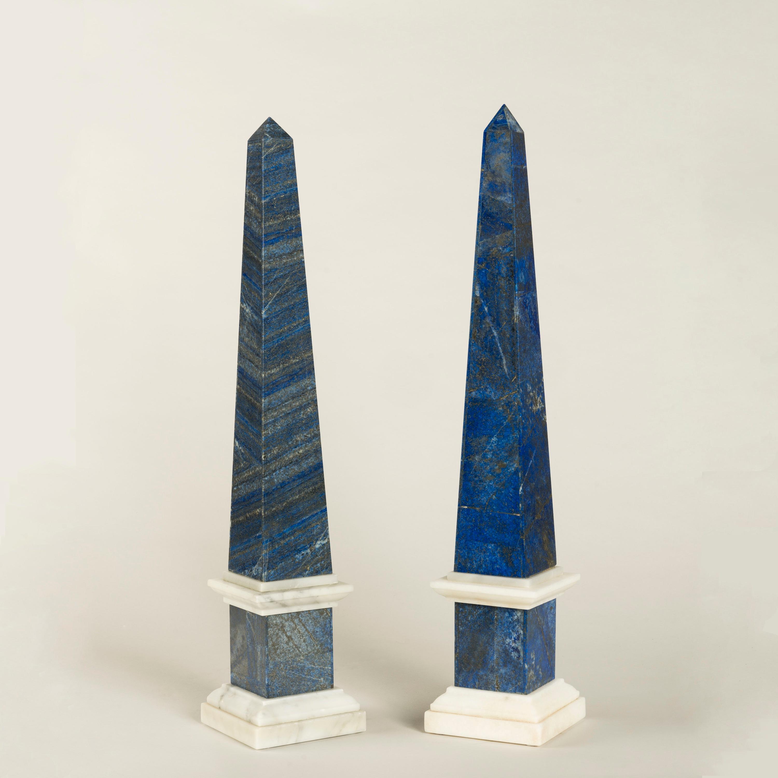 A Near Pair of Lapis Lazuli Obelisks

Veneered with the rare and semi-precious deep blue lapis admired for its intense colour, each obelisk with Carrara marble bases and moulding.
Probably Venetian, circa 1870

Lapis lazuli, along with other