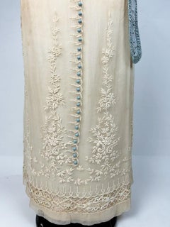 A neo-classical dress in embroidered cotton tulle and taffeta -France Circa 1910
