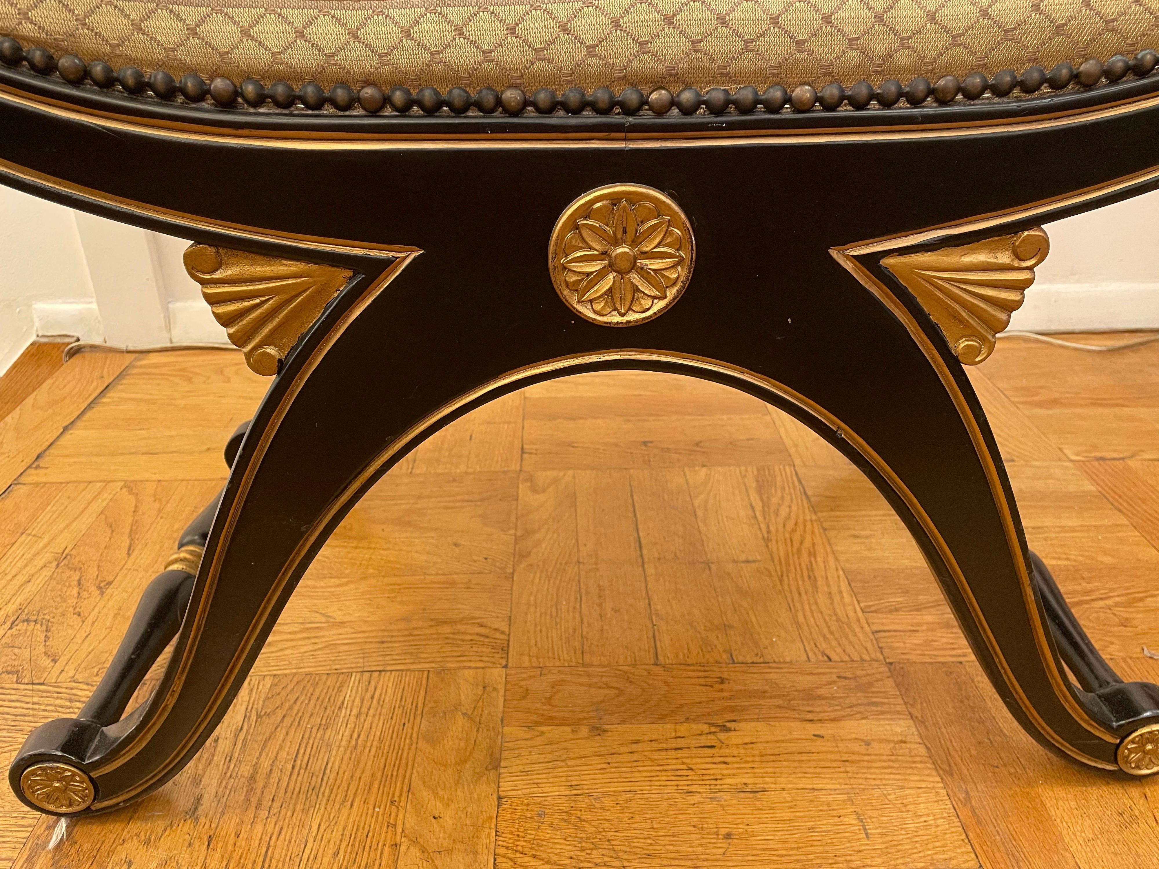This strong ebonized bench reflects the neoclassical aesthetic of the 19th century, yet dates from the early 20th century. Although we normally only deal with period pieces, we couldn't resist the clean lines, personality and beauty of this bench.