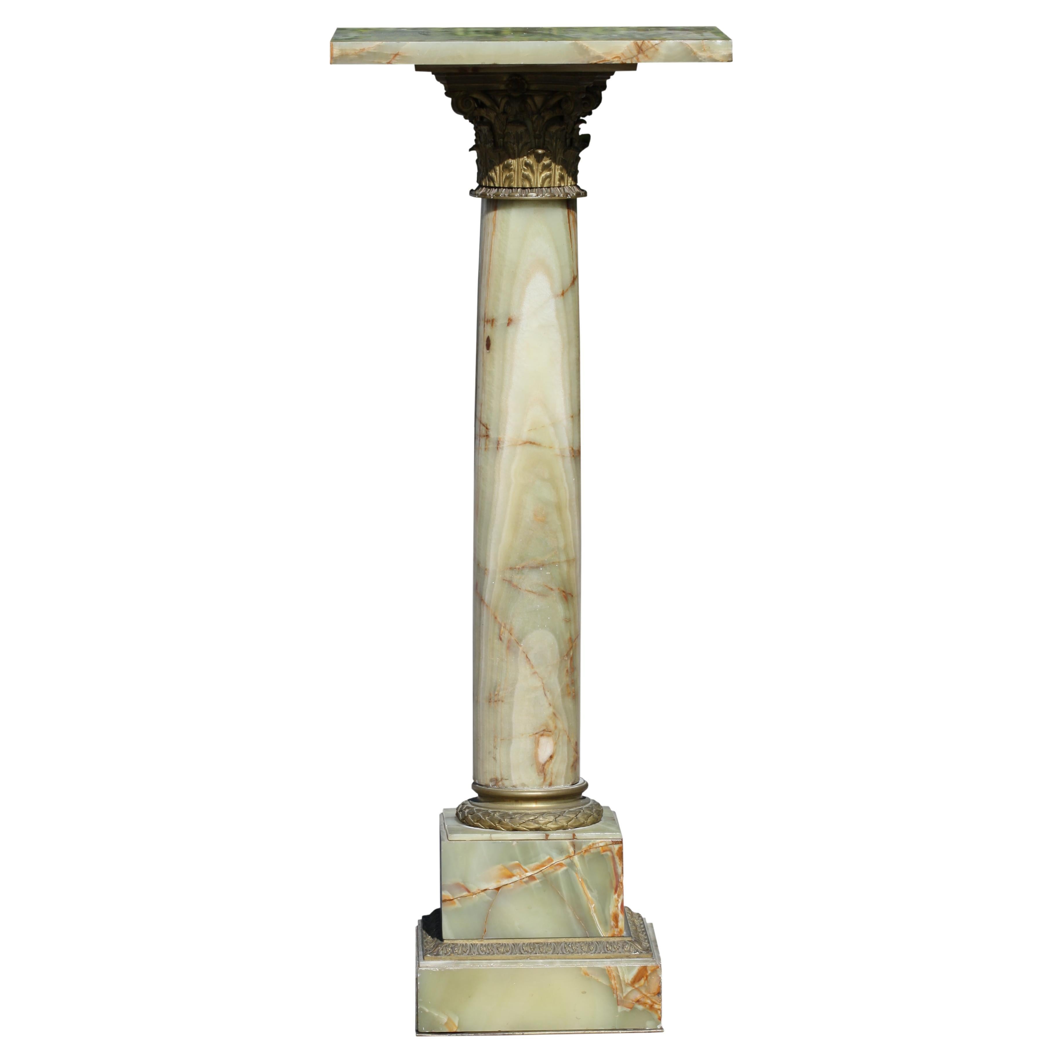 A Neoclassical Style Gilt Bronze Mounted Marble Pedestal