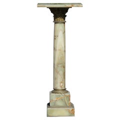 A Neoclassical Style Gilt Bronze Mounted Marble Pedestal