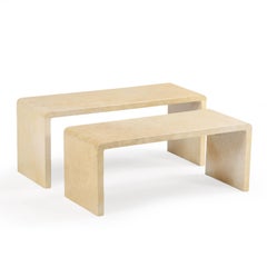 A Nesting Set of Two Pergamino Parchment Covered Tables.