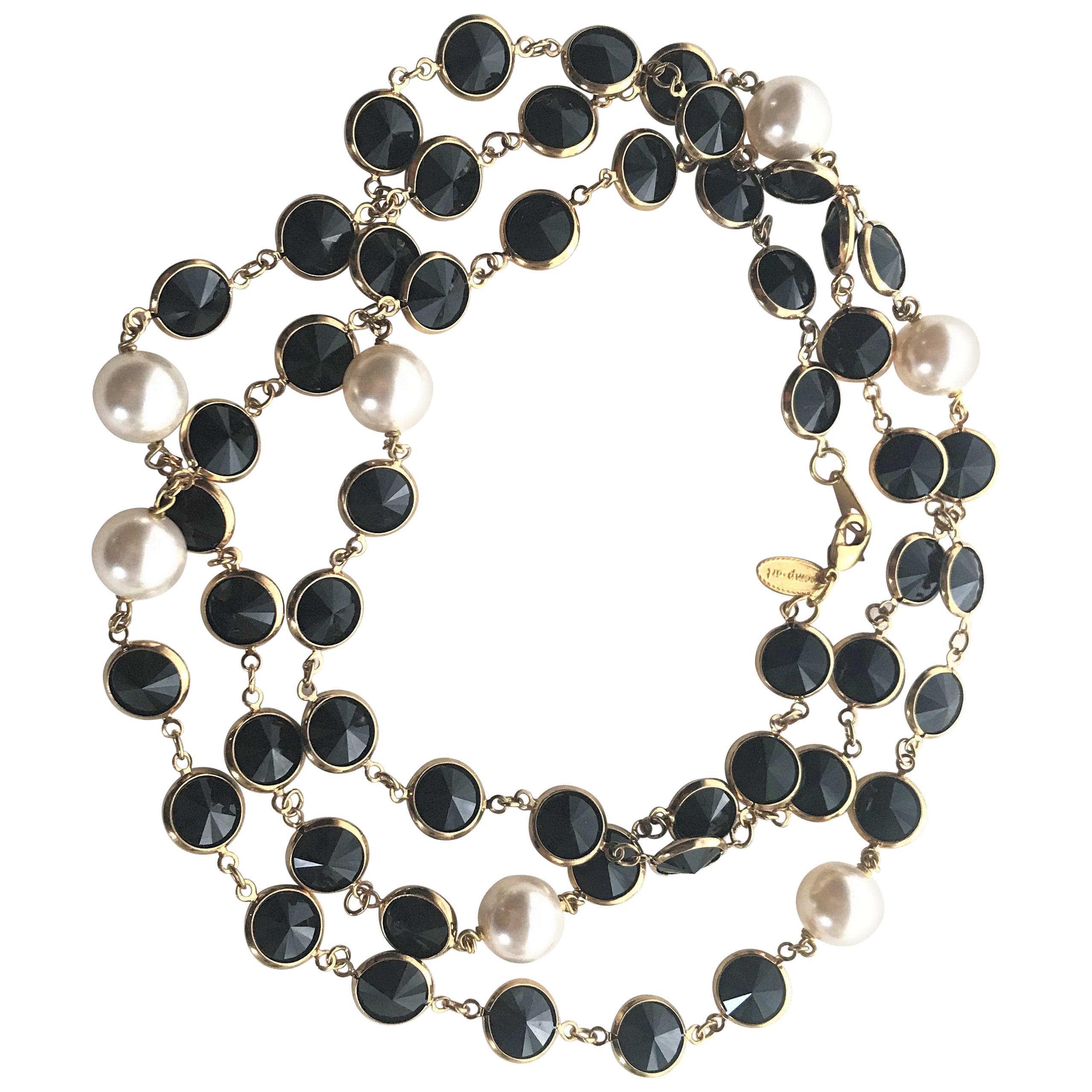 Like Chanel  but a new Necklace with black Swarovski stones and faux pearls 