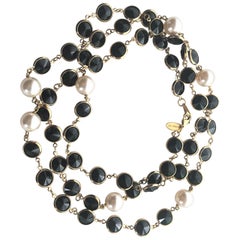 Like Chanel  but a new Necklace with black Swarovski stones and faux pearls